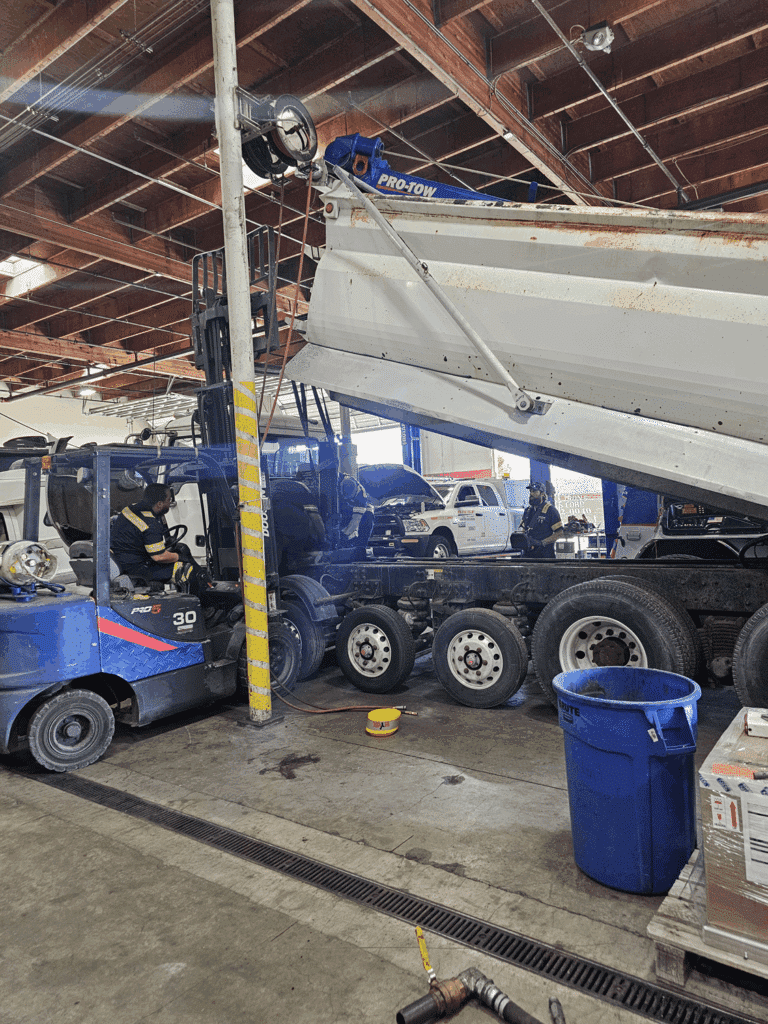 In-Shop Fleet Repairs - Lifting the Dump Truck