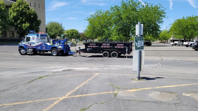Clean parking lot after spill response in Spokane